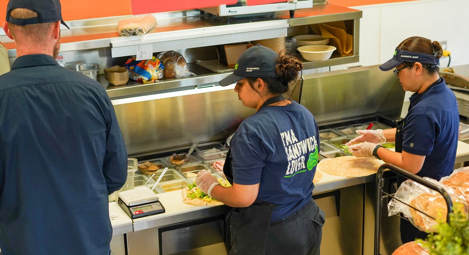 Press'd team getting a catering order ready.